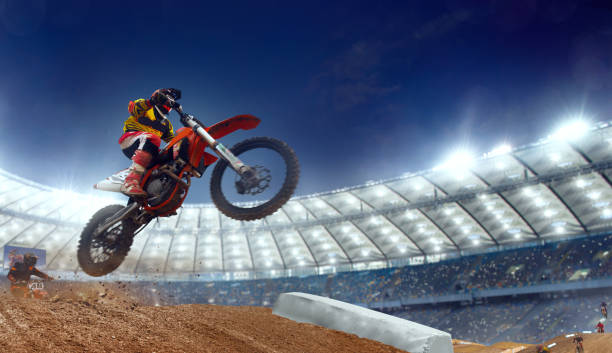 istock Motocross riders in action. 1161200012