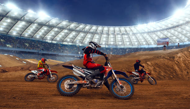istock Motocross riders in action. 1161200218