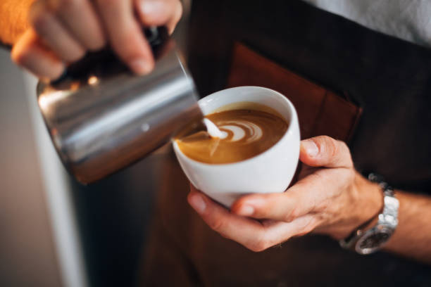 istock Barista pouring latte art 1161201481