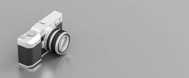 istock Retro looking digital camera isolated on gray background with copy space. 3D illustration. 1161201765