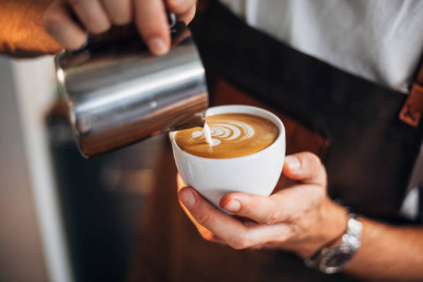 istock Barista pouring latte art 1161201855