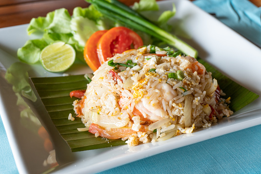 Fried rice with shrimp in a white dish in thai food style