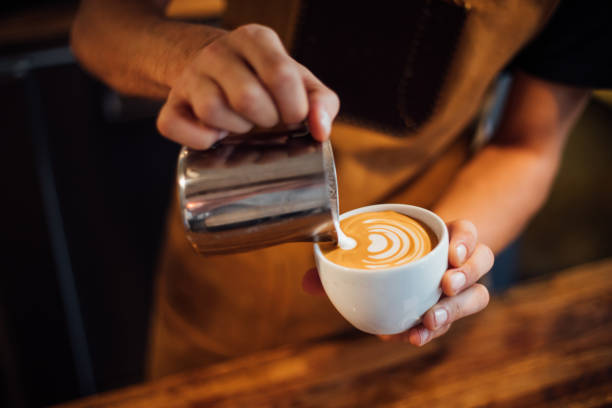 istock Barista making latte art 1161202572