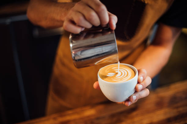 istock Barista making latte art 1161202761