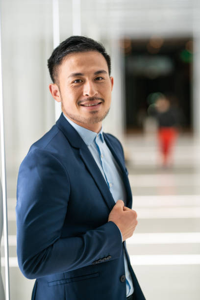 istock Joyful Chinese man in suit 1161204546