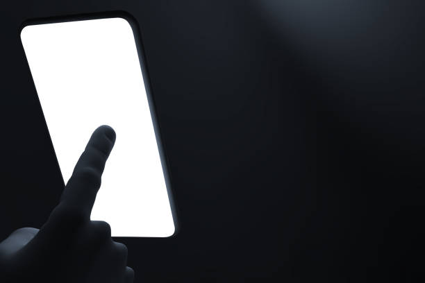 istock 3D rendering - view of hand man finger tapping smart-phone with white light in dark space or room 1161206043