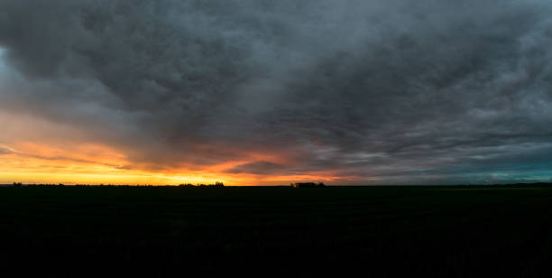 istock Dramatic sky over the dutch landscape after sunset 1161209734