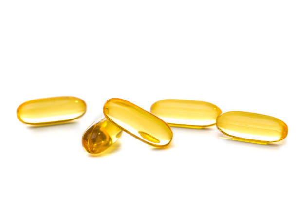 タラの肝油 - fish oil vitamin pill cod liver oil nutritional supplement ストックフォトと画像