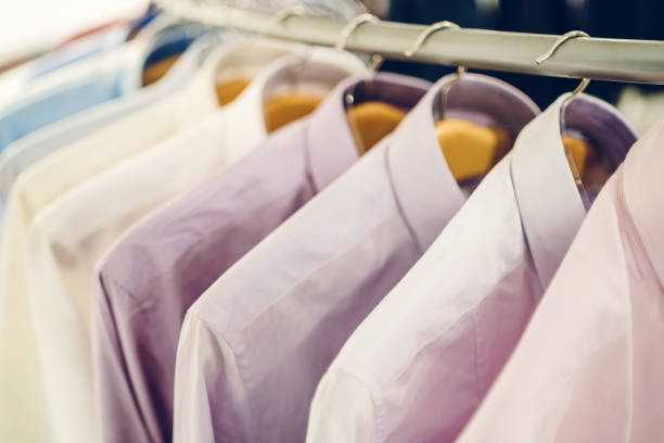 istock Men's shirts in clothing store 1161216619