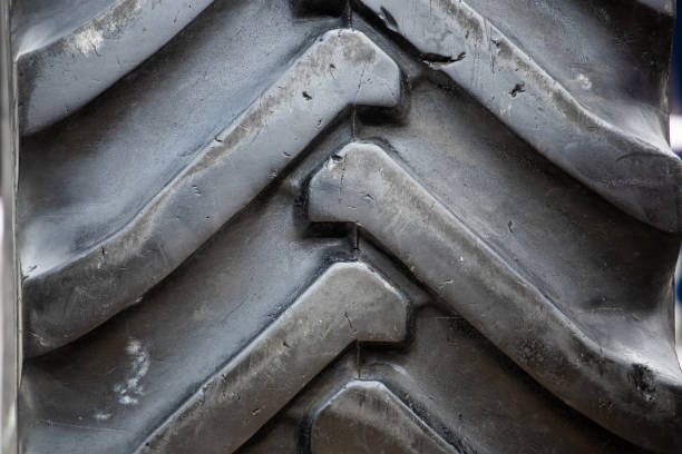 istock big treads on a black car tire 1161216767
