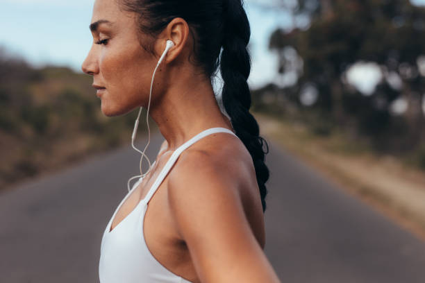 istock Female runner listening to music 1161219420