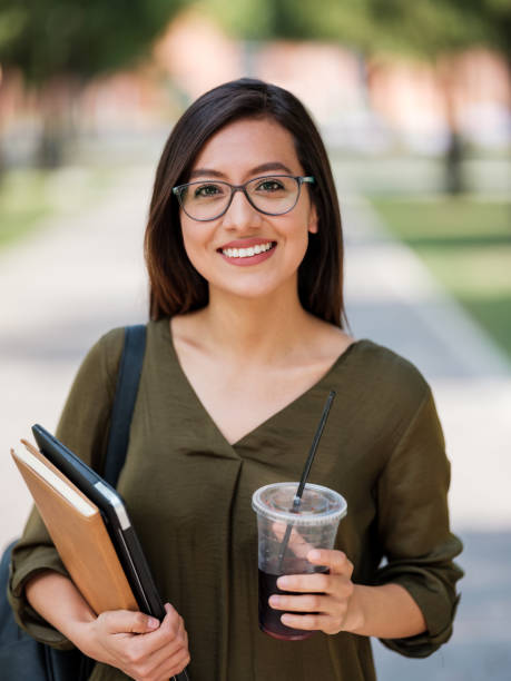 istock Beautiful latina university student 1161222690