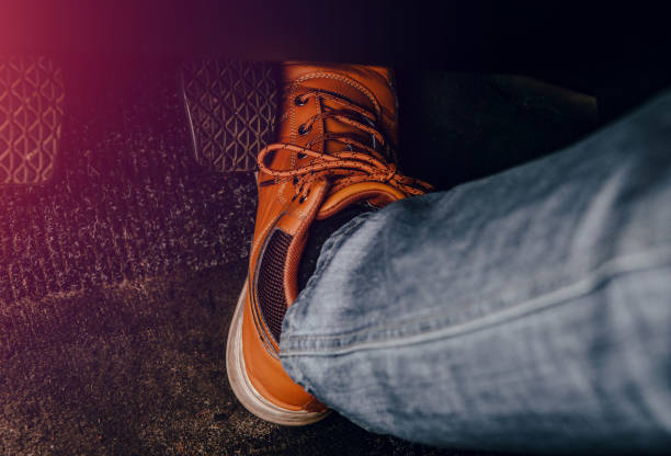 istock Leg pressing the gas pedal. 1161222787