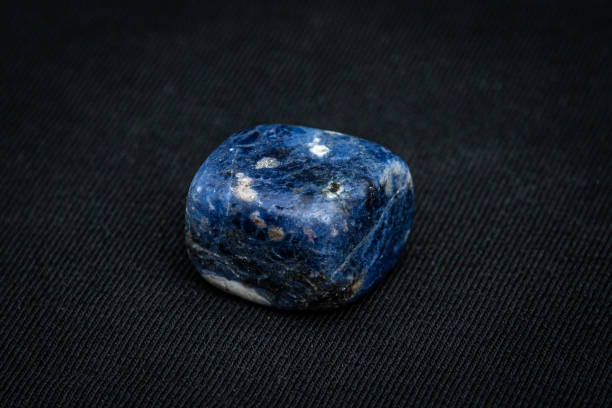 istock Sodalite gemstone different tones of blue white and black 1161226387