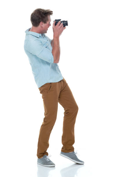 istock Handsome male photographer 1161226628