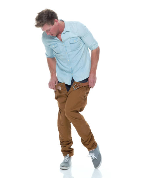 istock Attractive caucasian male is caught with his pants down 1161226705