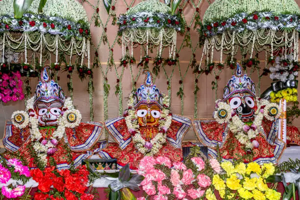 Photo of Idols of Hindu God Jagannath, Balaram and Goddess Subhadra Beautifully decorated during the Rath Yatra Festival.