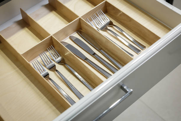 istock Stainless knives and forks in a kitchen utensil box 1161231082