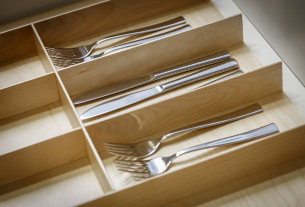 istock Stainless knives and forks in a kitchen utensil box 1161231085