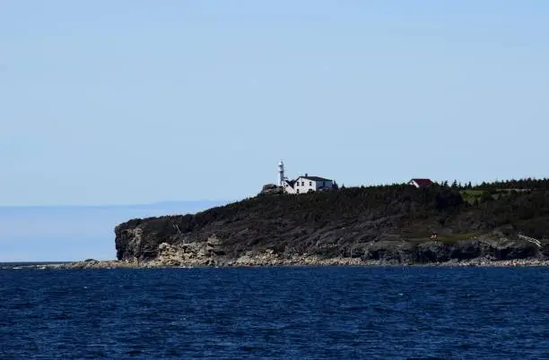 Photo of bay view towards Lobster Cove Head lighthouse