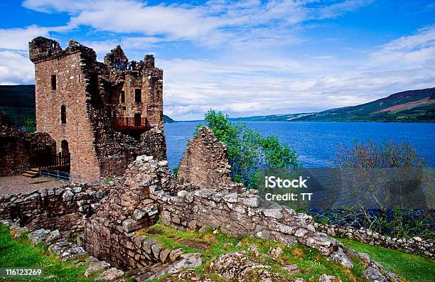 Ruins Of Urquhart Castle On The Hill Next To Blue Waters Stock Photo - Download Image Now