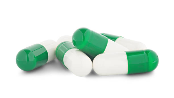 istock medical pills on white isolated background with shadow. 1161240229