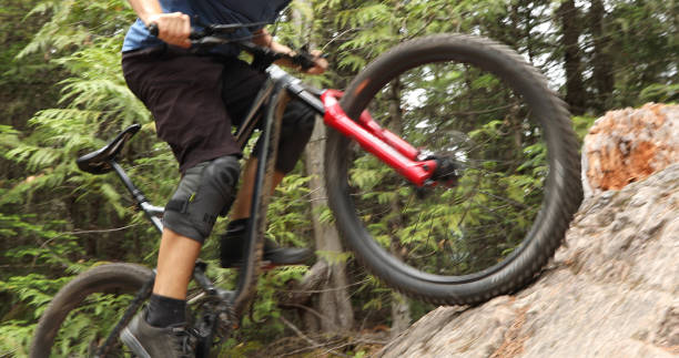 istock Mountain biker ascends steep rock slab 1161241545