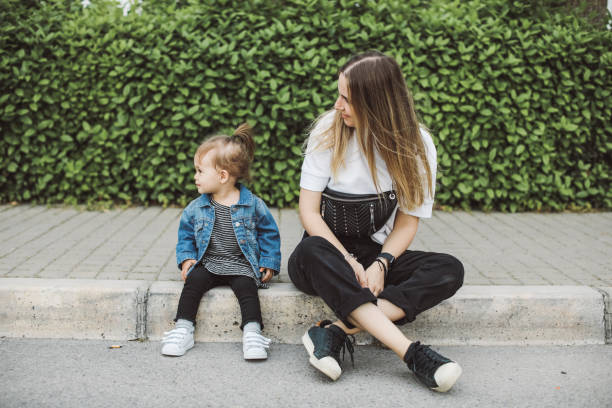 istock Smiling young mum talking with little daughter 1161244185