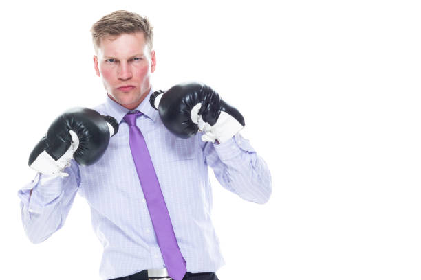 istock Handsome businessman boxing 1161244325