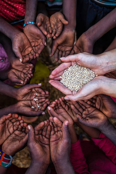 istock Hands of poor - asking for food, Africa 1161246984