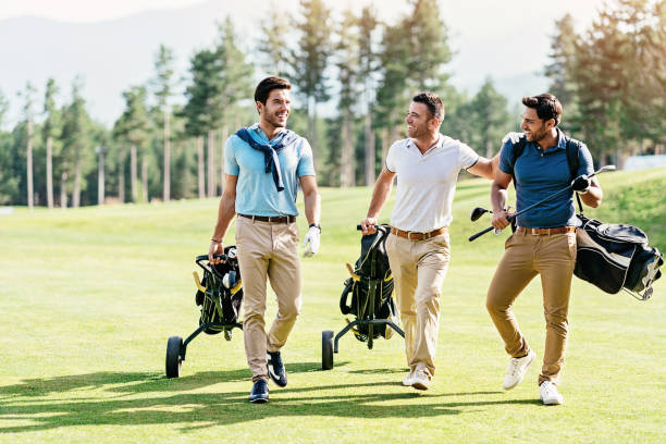 istock Male friends playing golf together 1161248281