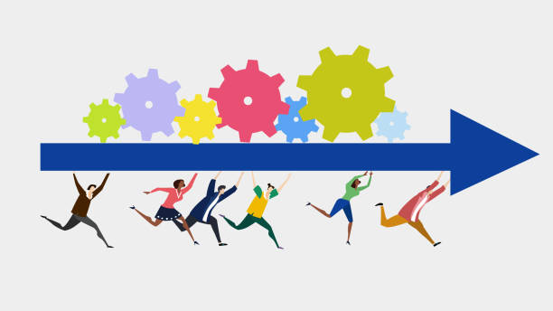 istock Group of young motivated people running together in one direction and holding the arrow with rotating gears 1161251480