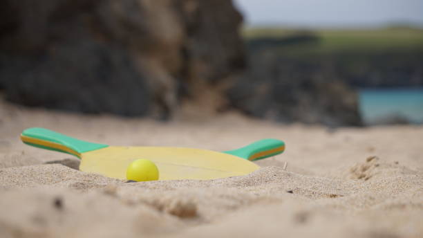 istock Bat and ball abandoned on a sandy beach in Harlyn Bay, Cornwall. 1161252996