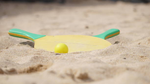 istock Bat and ball abandoned on a sandy beach in Harlyn Bay, Cornwall. 1161253001