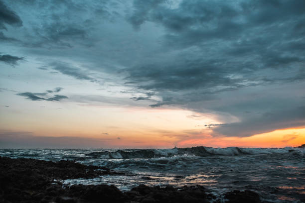 istock Sunset with Dramatic Sky over the Sea After Storm 1161259155