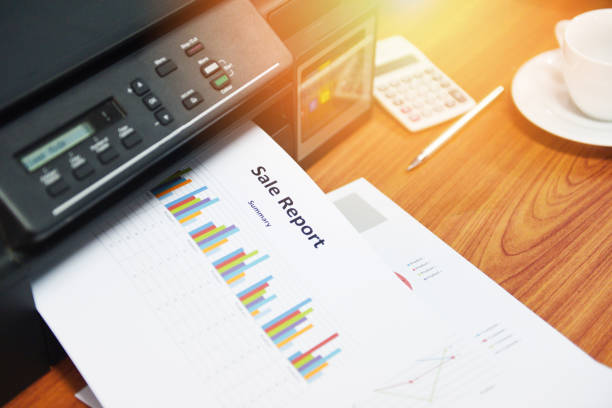 istock printer printing business reports sale and pile of documents report graph chart at office 1161261147