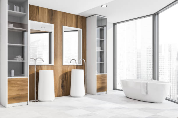 istock White and wood bathroom corner, double sink, tub 1161261646