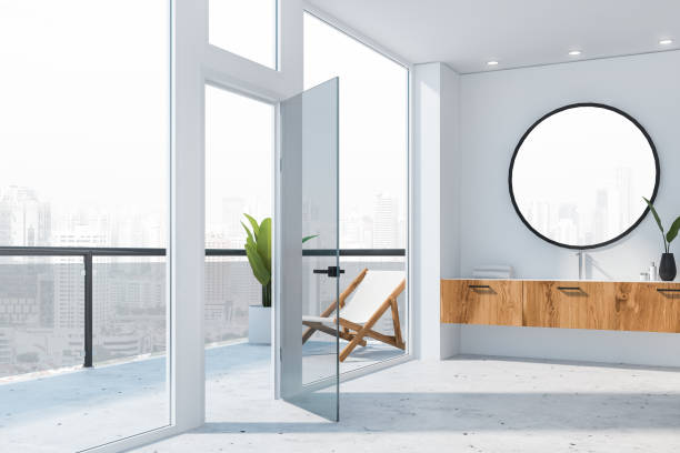 istock White bathroom with sink and balcony 1161261668