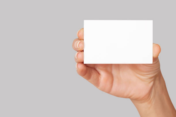 istock hand holding blank business card 1161262258