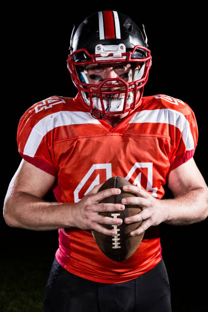 istock Football player portrait on black background 1161263587