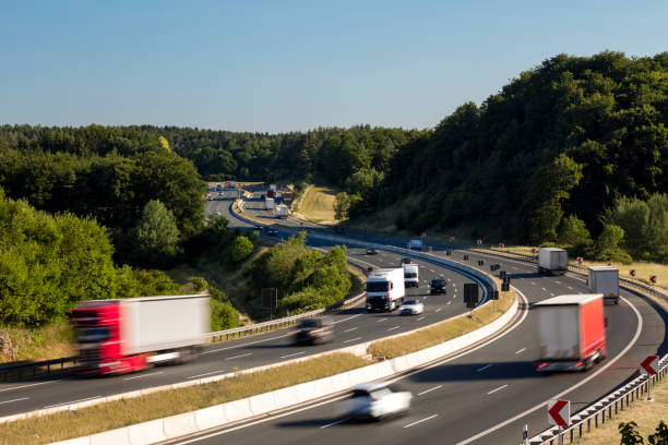 istock Semi Trucks Speeding on Highway, Heavy Goods Transportation in Germany 1161267227