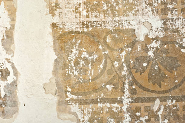 istock The texture of an old concrete wall with drawings and patterns. 1161271858