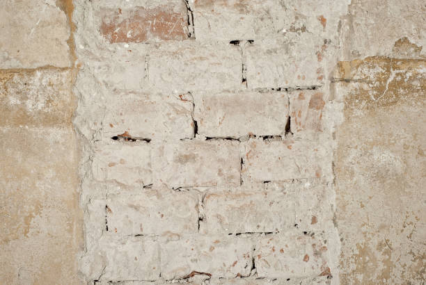 istock The texture of an old concrete wall with drawings and patterns. 1161271859