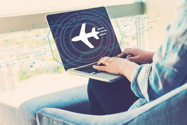 istock Airplane travel theme with woman using laptop 1161275453