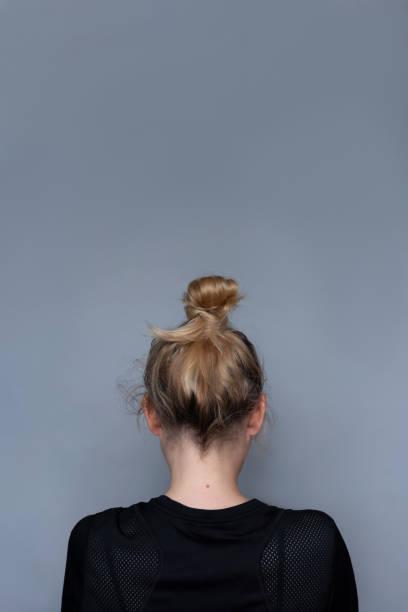 istock Young girl simple hairstyle back view 1161278771
