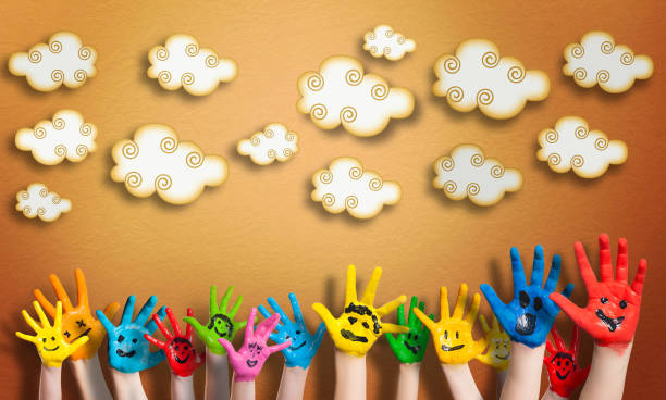 istock many painted children hands with smileys 1161281856