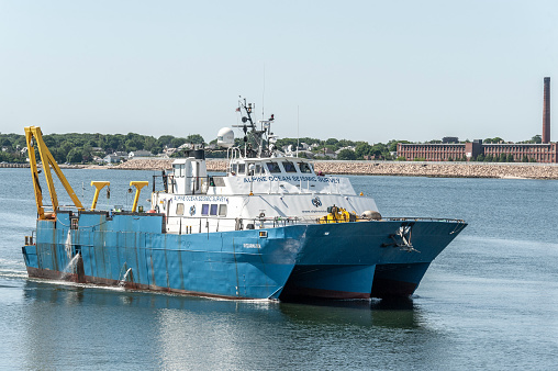 New Bedford, Massachusetts, USA - July 9, 2019:  Geotechnical survey vessel Shearwater, hailing port New York, New York, on Acushnet River in New Bedford