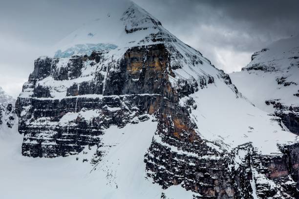 istock Snow capped mountain peak in winter 1161283786