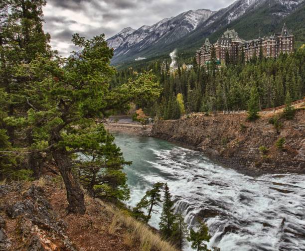 istock View across river to hotel in the forest 1161283873