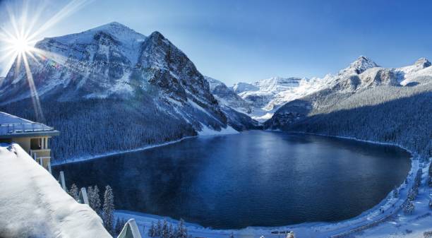 istock Frozen lake and snowcapped mountains 1161283893